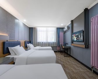 Jinmen Zhixing Express Hotel Tianjin Dongli Development Zone - Tianjín - Habitación