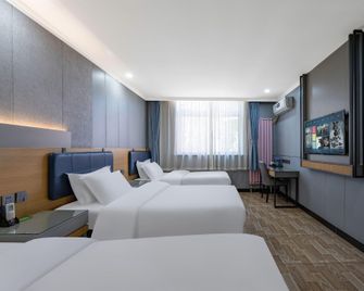 Jinmen Zhixing Express Hotel Tianjin Dongli Development Zone - تيانجين - غرفة نوم