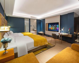 Guibinshe Hot Spring Hotel (Zhangzhou Nanjingjingcheng Yingbin West Road Branch) - Zhangzhou - Schlafzimmer