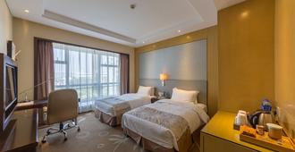 International Airport Garden Hotel - Xiamen - Bedroom