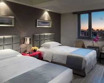 City Line Hotel - בייג'ין - חדר שינה