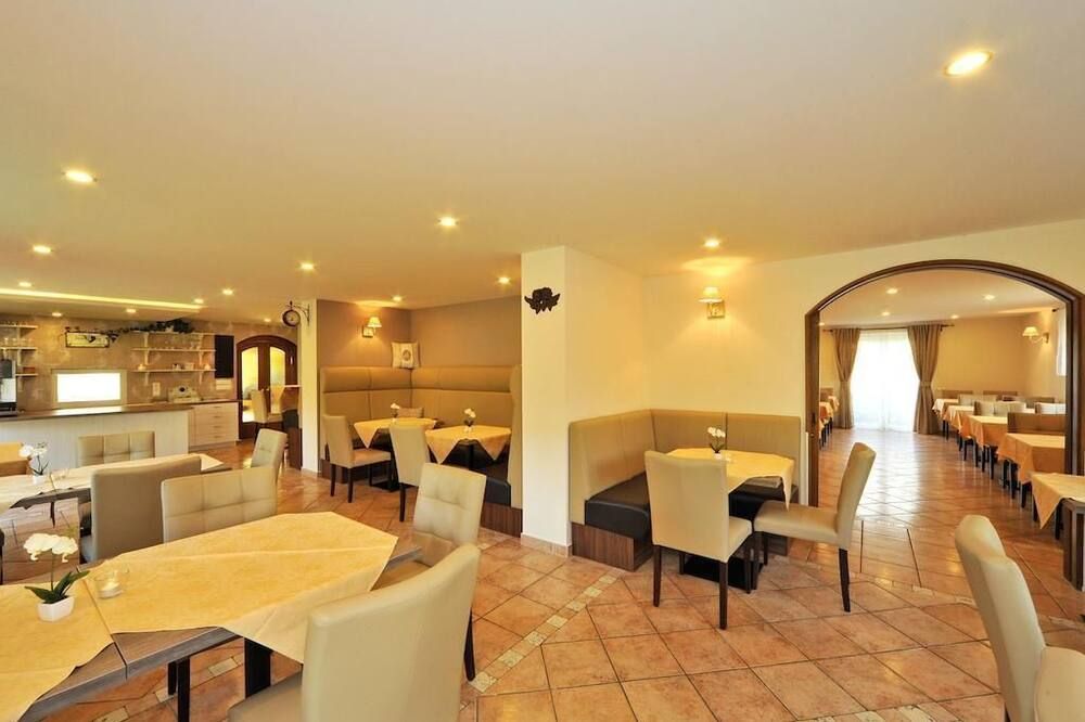 Doppelzimmer mit Balkon - Pension Piovesan - Latschach - Restaurant