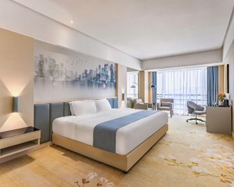 Wanpan Hotel - دونغقوان - غرفة نوم