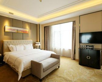Junjingwan Hotel (Foshan Lishui Shayong Branch) - Fo-šan - Ložnice