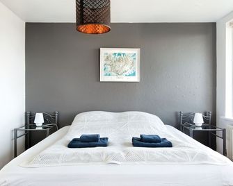 Grótta Northern Lights - Apartment & Rooms - Reykjavík - Schlafzimmer