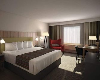 Country Inn & Suites by Radisson, Jackson, TN - ג'קסון - חדר שינה