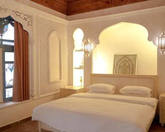 Yi Jing Qian Xun Homestay - Kaszgar - Sypialnia