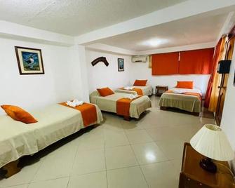 Fernandina Hotel & Spa - Puerto Ayora - Soveværelse