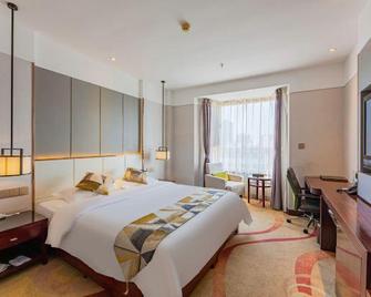 Qinhuangdao Haishanghai International Hotel - Qinhuangdao - Schlafzimmer