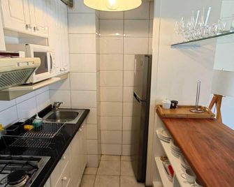 Apartamentos Costanera Centre - Santiago - Kitchen