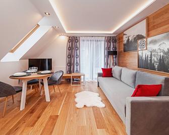 Apartamenty Sun & Snow Resorts H Bialka Tatrzanska z sauna - Białka Tatrzańska - Living room