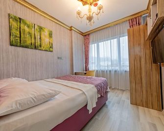 Royal Babil Suites Hotel - Pelitli - Bedroom