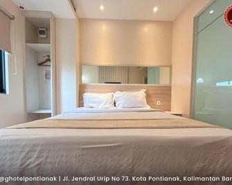 G-Hotel Pontianak - Pontianak - Quarto