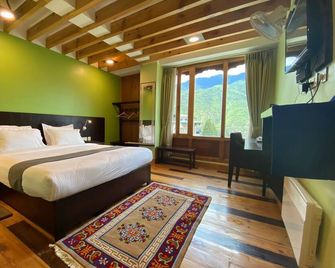Hotel Damisa - Thimphu - Schlafzimmer