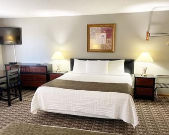 Burke Inn Motel & Suites - Carroll - Schlafzimmer