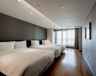 Oriens Hotel & Residences Myeongdong - Seul - Camera da letto