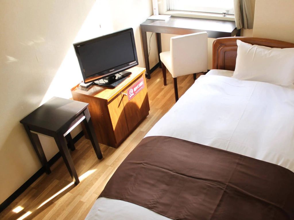 Hotel Livemax Budget Kawasaki Ekimae - קאוואסאקי - חדר שינה