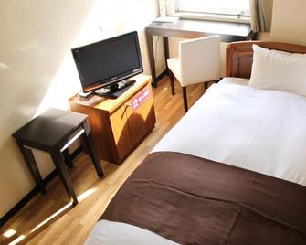 Hotel Livemax Budget Kawasaki Ekimae - Kawasaki - Schlafzimmer