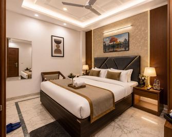 Hotel Vegas Corporate Suites - Noida - Schlafzimmer