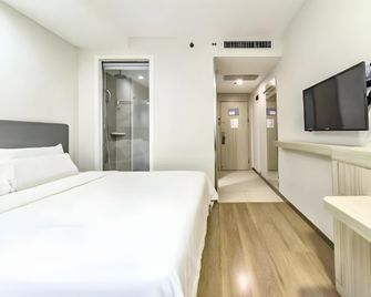 Hanting Hotel Shanghai Hongkou Football Stadium Metro Station - Shanghai - Schlafzimmer