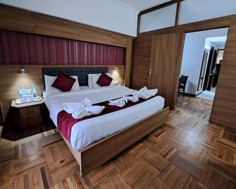 Hotel Preethi Classic Towers - อูตี้ - ห้องนอน