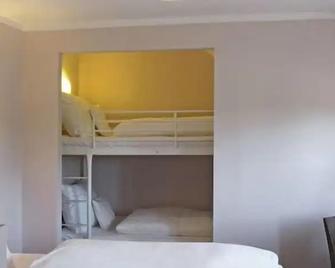 Self Checkin Hotel Heckenrose Lorin - Ringsheim - Bedroom
