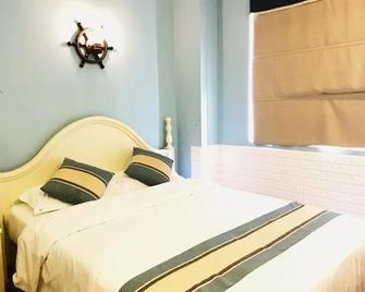 Haiyun Youth Travel Hotel (Leshan Giant Buddha Zhanggongqiao Food Street Branch) - Leshan