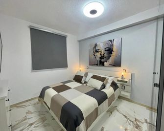 هوتل بويرتو كانتيراس - لاس بالماس دي غران كناريا - غرفة نوم