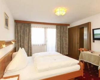 Hotel Neuwirt - Mieming - Спальня
