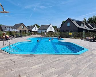 Child-friendly, but above all luxurious holiday home near the sea and dunes. The house is fully equipped. - Sint Maarten - Pool