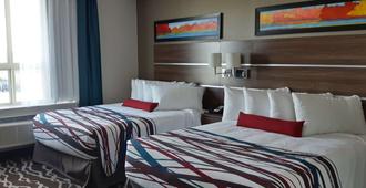 Encore Suites by Service Plus Inns - Grande Prairie - Bedroom