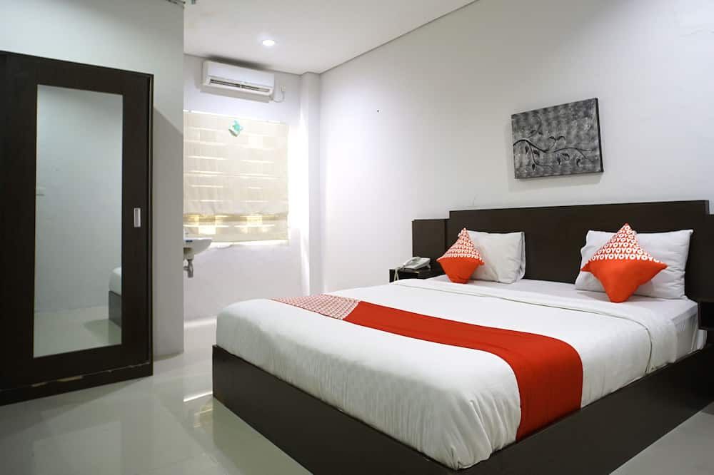 OYO 1477 Athar 88 Hotel - Balikpapan - Slaapkamer
