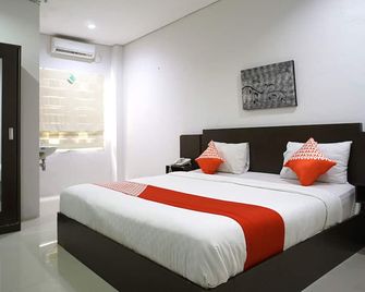 OYO 1477 Athar 88 Hotel - Balikpapan - Slaapkamer