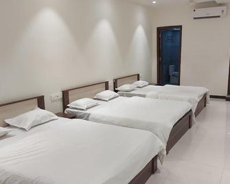 Santoshi Novatel Hotel - Raichur - Bedroom