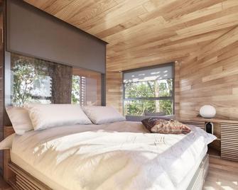 Treehouse with walkway to a jacuzzi - Raray - Habitación