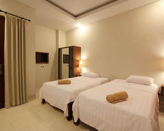 Saren Guesthouse Bali - North Kuta - Chambre