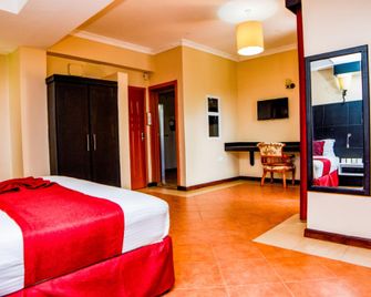 Hotel Isamilo Lodges - Mwanza - Schlafzimmer