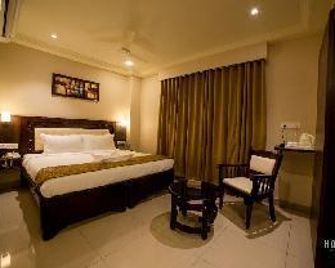 Haian- An Olive Tree Hotel - Vijayawada - Schlafzimmer