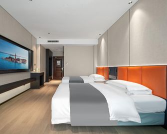 Guangsha Hotel - שאושינג - חדר שינה