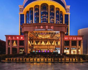 Shenzhen Shanghai Hotel -Complimentary Mini Bar and Late Check Out - Shenzhen - Edificio
