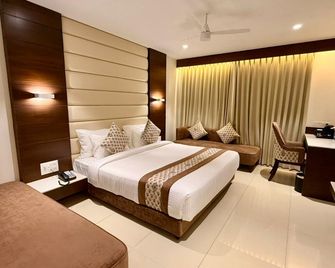 Hotel Atharva - Ujjain - Bedroom