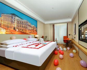 Vienna International Hotel Zigong Lantern Park Fanhua Shopping Plaza - Zigong - Bedroom