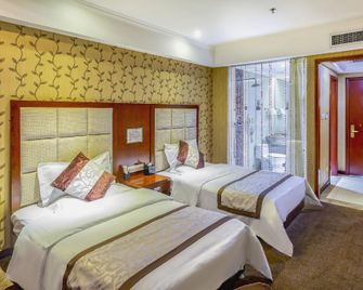 Yihai International Business Hotel - Zhangjiakou - Camera da letto