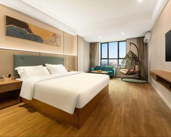 Shenzhen Zhili Hotel - Shenzhen - Bedroom