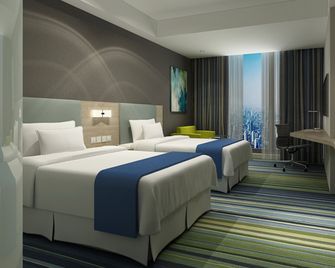 Holiday Inn Express Yingkou Onelong Plaza By IHG - Yingkou - Bedroom