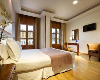 هوتل إي إكس إي تريونفو - غرناطة - غرفة نوم