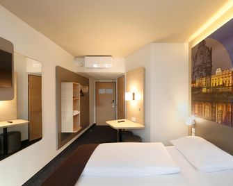 بي آند بي هوتل بيرلين سيتي ويست - برلين - غرفة نوم
