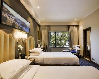 Sun N Sand Hotel Mumbai - Mumbai - Phòng ngủ