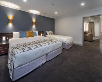 Hyde Park Inn - Sydney - Kamar Tidur