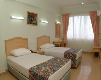Li Hua Hotel Bintulu - Bintulu - Schlafzimmer